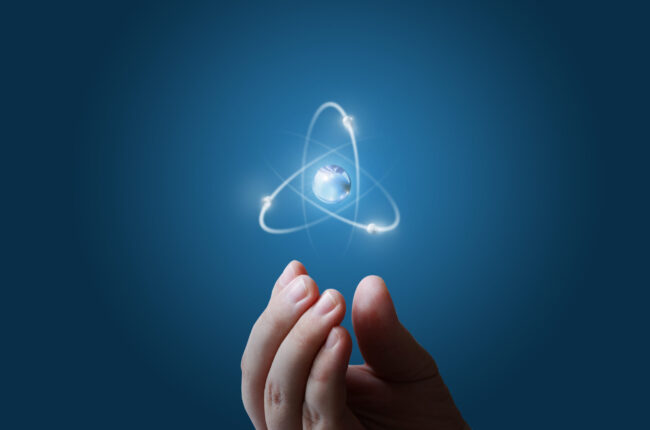 Atoms flying along the orbit in the hand.